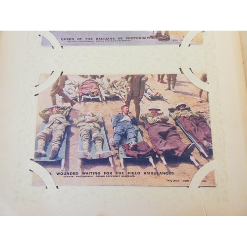 330 - Postcard album containing 52 First World War scenes to include the famous A Present for the Kaiser 