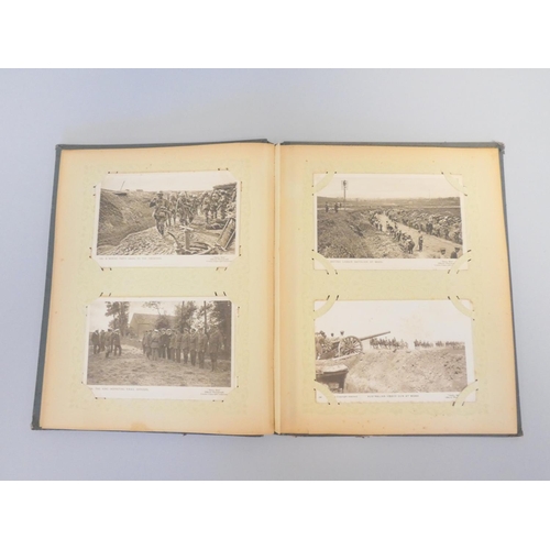 330 - Postcard album containing 52 First World War scenes to include the famous A Present for the Kaiser 