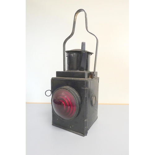 344 - 1930s paraffin BR warning light in black japanned finish with red convex lens. 