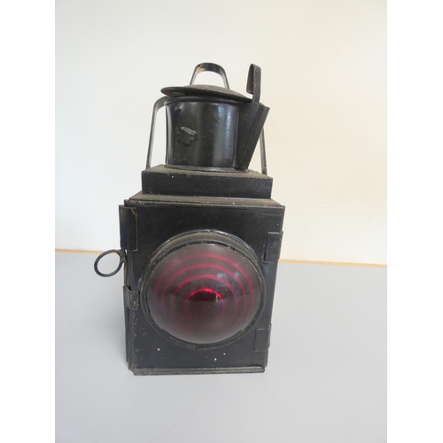 344 - 1930s paraffin BR warning light in black japanned finish with red convex lens. 