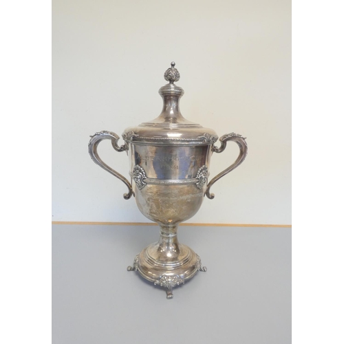 391 - Large silver two handled lidded cup by Birmingham makers Mappin and Webb 1928 with scrolled floral h... 