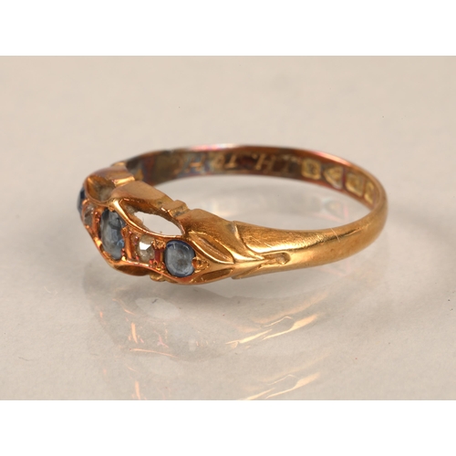 186 - 18ct gold ring set with diamonds and blue gems, gross weight 2.6g, ring size M