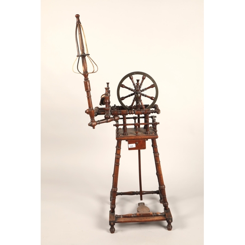 526 - Mahogany spinning wheel, approx 87cm to top of wheel