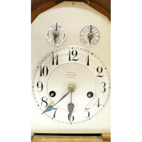 195 - Continental oak-cased bracket clock, c. early 20th century, the arched shaped clock with twin reeded... 