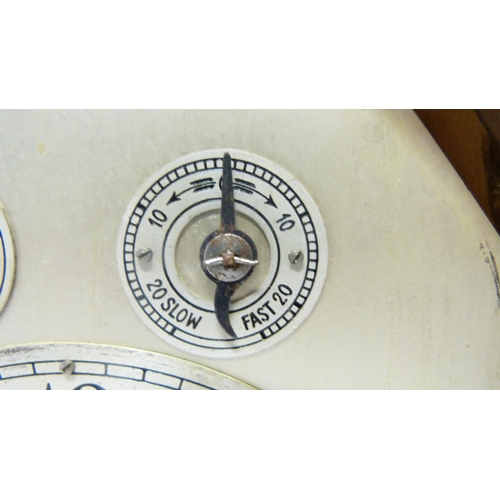 195 - Continental oak-cased bracket clock, c. early 20th century, the arched shaped clock with twin reeded... 