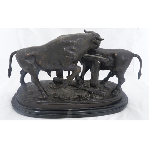 380 - After Pierre-Jules Mêne (French, 1810 - 1879)Cast bronze study in the form of two bulls either side ... 