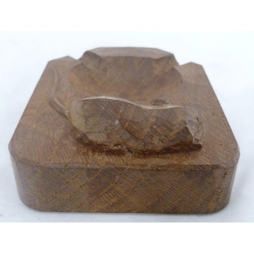 217 - Workshop of Robert 'Mouseman' Thompson of KilburnOak ashtray, bearing carved trademark mouse, 2cm x ... 