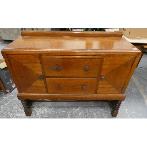 509 - Vintage oak sideboard, two drawers, central two doors on barley twist legs.