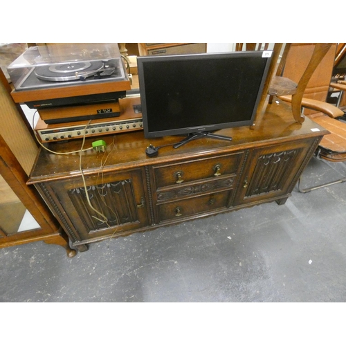 502 - Vintage oak sideboard with carved doors.