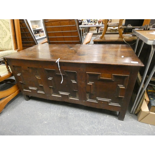 507 - Antique oak coffer with three decorative panels to front.