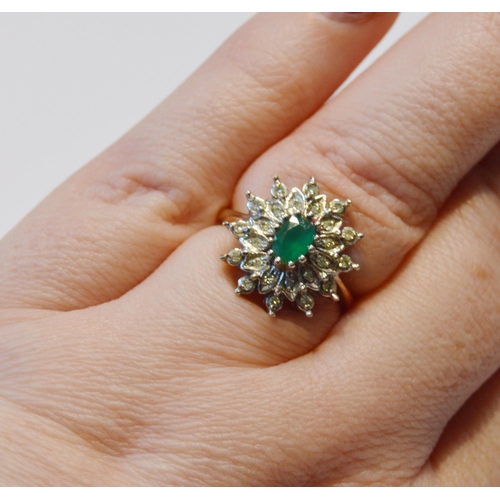 112 - Diamond and emerald oval cluster ring with eight-cut brilliants, in 9ct gold, size L½, 4g gross.