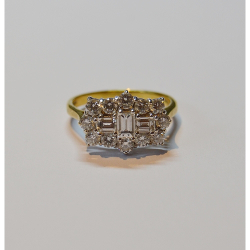 119 - Diamond ring with a rectangular setting of three baguettes and twelve brilliants, in 18ct gold, size... 