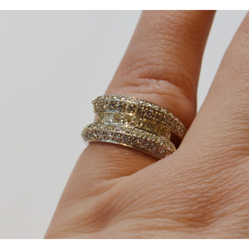 122 - Diamond eternity-style ring with four bands of brilliants and a band of princess-cut brilliants, in ... 