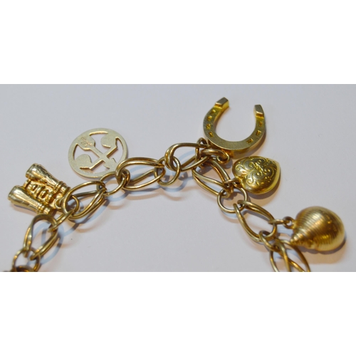 141 - 9ct gold padlock bracelet with dependant charms, marked '375' to most, 22g gross.