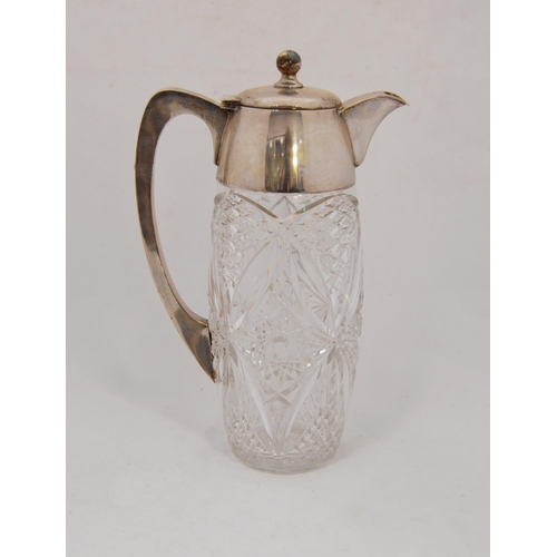 69 - Continental silver-mounted cut glass jug, c. early 20th century, marked 800, 28cm high.