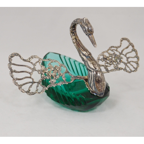 70 - Silver-mounted open salt dish in the form of a swan, the wings opening to reveal the green glass bas... 