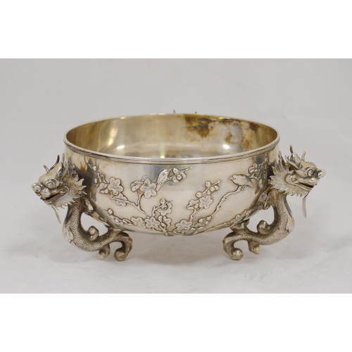 79 - Chinese export silver bowl by Luen Wo, Shanghai, with applied trefoil dragon handles, the exterior e... 