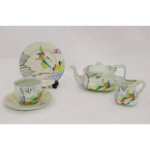 251 - Carlton Ware Handcraft 'Garden Gate' pattern tea for one set, c. 1930s, comprising a teapot, cream j... 