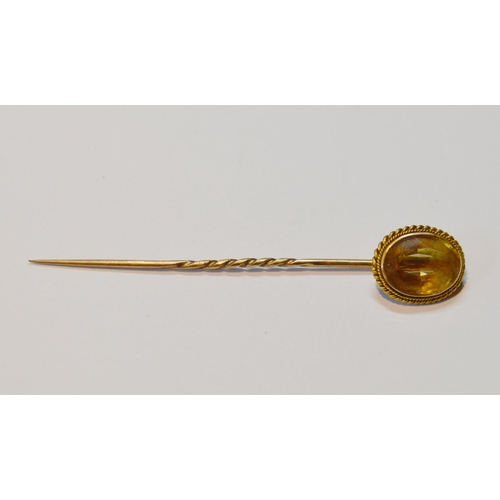 160 - Tiger's eye brooch in unmarked gold, 8.6g gross, a pearl ring, 'K15', 1.7g gross, and an unmarked sc... 