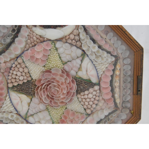 215 - Pair of early Victorian shell collages, enclosed in a glazed octagonal display case, 32cm x 31cm.