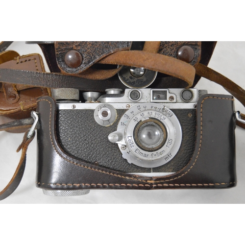 202 - Leica 111B Rangefinder camera, c. 1939, no. 224272, with a Leitz Elmar Summitar F-5cm lens, cased, E... 