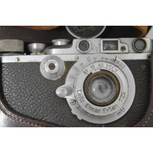 202 - Leica 111B Rangefinder camera, c. 1939, no. 224272, with a Leitz Elmar Summitar F-5cm lens, cased, E... 