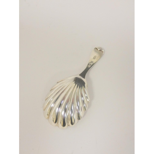 17 - Silver caddy spoon of Georgian scallop style, a similar preserve spoon and an engraved pencil case. ... 