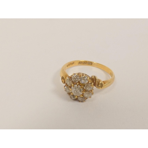 35 - Diamond nine stone cluster ring with old cut brilliants, in 18ct gold c1930. Size M. 3.3g.