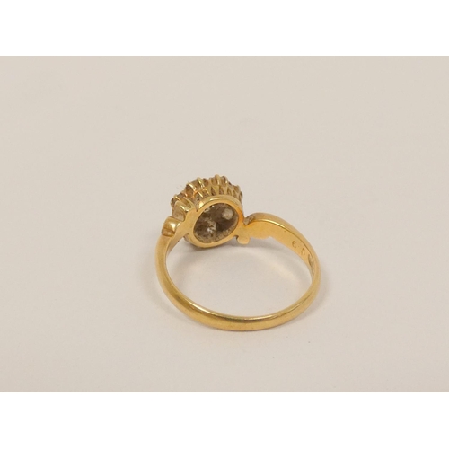 35 - Diamond nine stone cluster ring with old cut brilliants, in 18ct gold c1930. Size M. 3.3g.