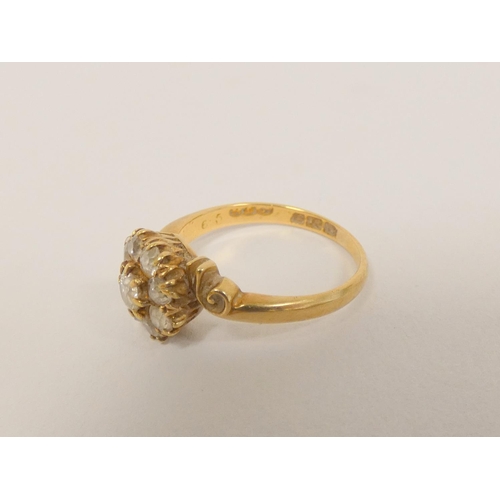 35 - Diamond nine stone cluster ring with old cut brilliants, in 18ct gold c1930. Size M. 3.3g.