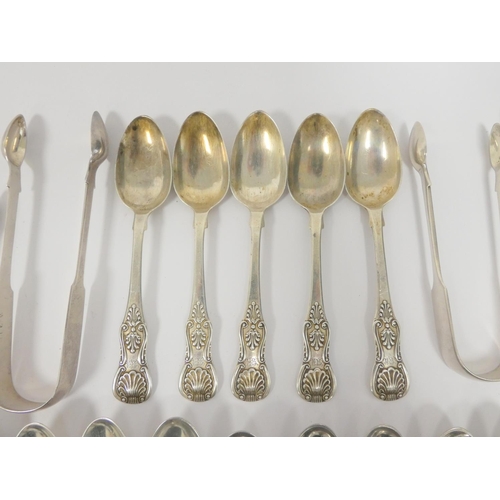 4 - Seventeen silver teaspoons and four sugar tongs 463g 