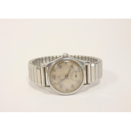 6 - Gents Omega watch with silvered dial in stainless steel case, 1940s/50s.