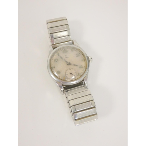 6 - Gents Omega watch with silvered dial in stainless steel case, 1940s/50s.