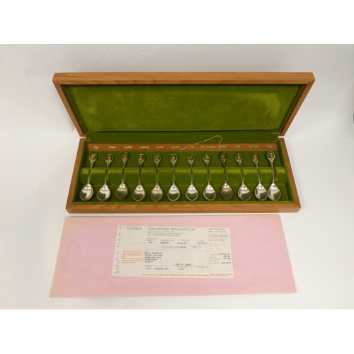 8 - Set of twelve silver R.H.S Flower spoons, in wooden case. 235g 