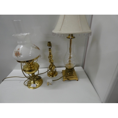 1 - Three modern brass table lamps.