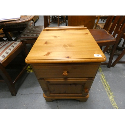 59 - Small pine bedside drawer with cupboard to base....