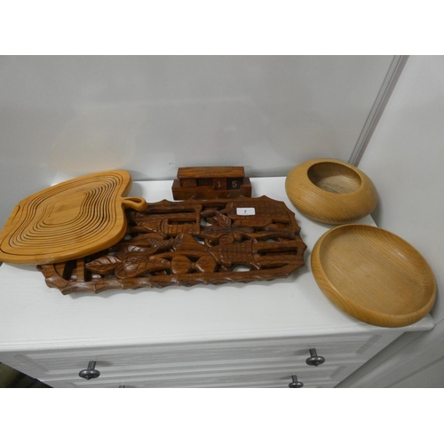 7 - Collection of treen to include carved wall plaques, bowl and calendar....