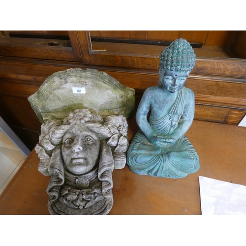 82 - Large resin Buddha garden figure and constituted stone wall plaque. 