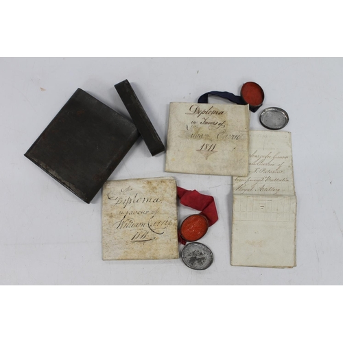 693 - 19th century documents to include two diploma of William Carrie dated 1811 on vellum and a discharge... 