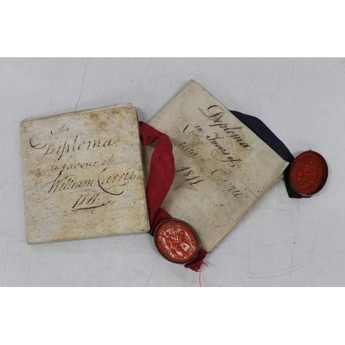 693 - 19th century documents to include two diploma of William Carrie dated 1811 on vellum and a discharge... 