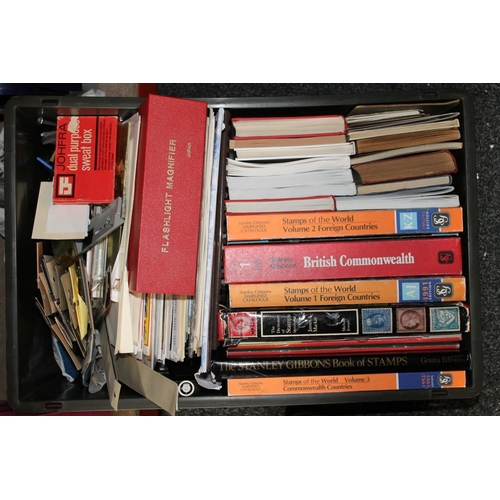 712 - Box of philatelic materials to include Stanley Gibbons catalogues, loose album pages, booklets and o... 