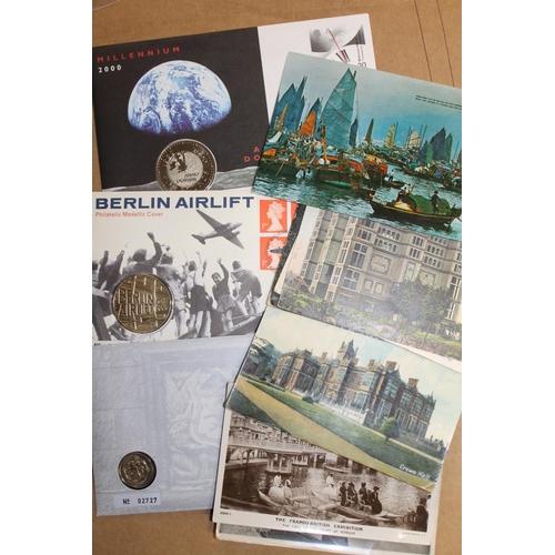 716 - Three numismatic philatelic coin covers to include £5 1999, £1 1999 and Berlin Airlift medallic cove... 