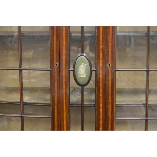 415 - Edwardian inlaid mahogany display cabinet with two astragal glazed doors inset with a classical-them... 