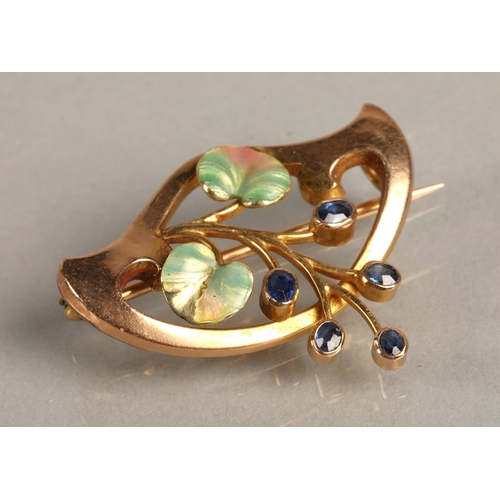 100 - 15K gold brooch set with sapphires and enamelled leaf detail, 3g