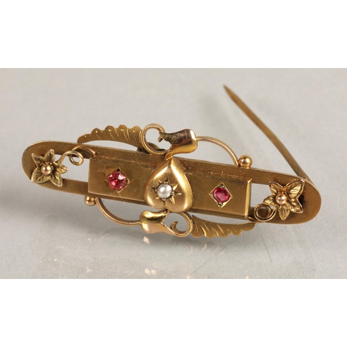 102 - 9ct gold bar brooch set with a seed pearl and two rubies, 3g