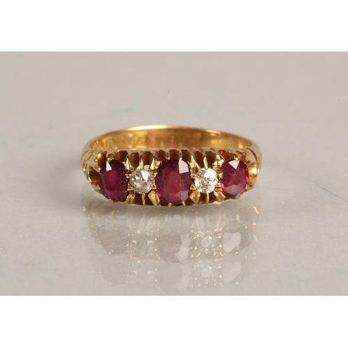 106 - 18ct gold ring set with three rubies interspersed wit two small diamonds, ring size O, 4g