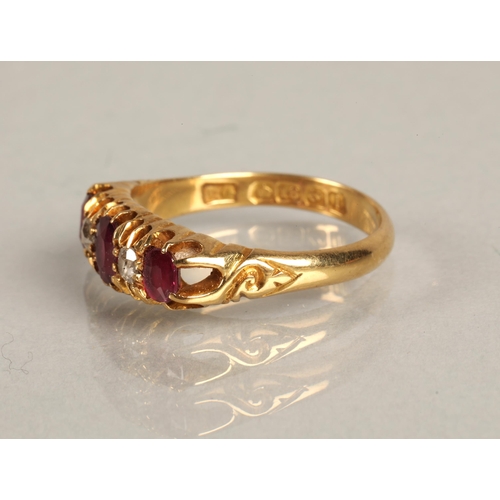 106 - 18ct gold ring set with three rubies interspersed wit two small diamonds, ring size O, 4g