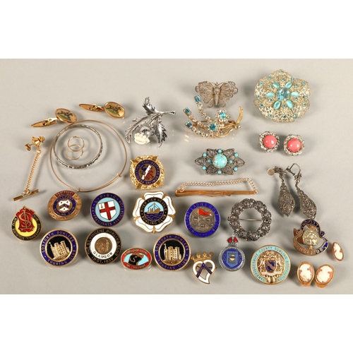 110 - Assorted brooches, sports club pins some silver, etc