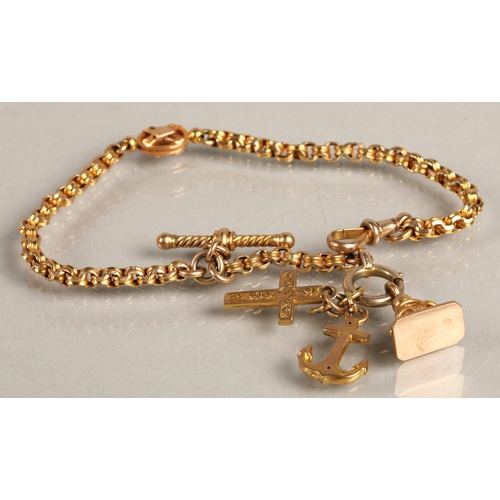 112 - 9ct gold watch chain with yellow metal fobs / charms, gross weight 10.5g