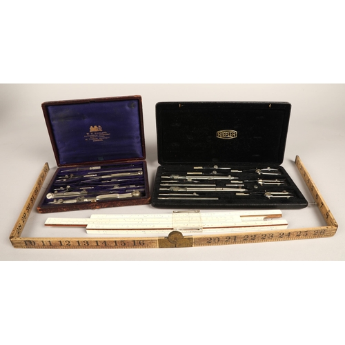 15 - Riefler cased drawing set, another also a slide rule etc